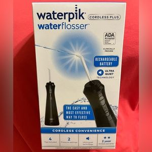 Waterpik Cordless Plus Water Flosser - 4 tips, 2 settings, 360 tip rotation.
